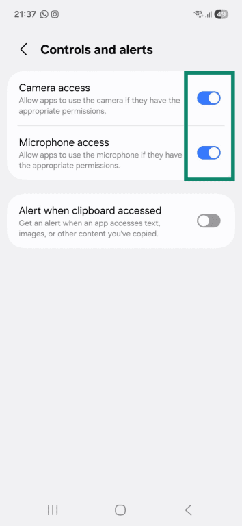 The "Controls and alerts" page on an Android phone. The on and off toggles for camera and microphone access are highlighted.